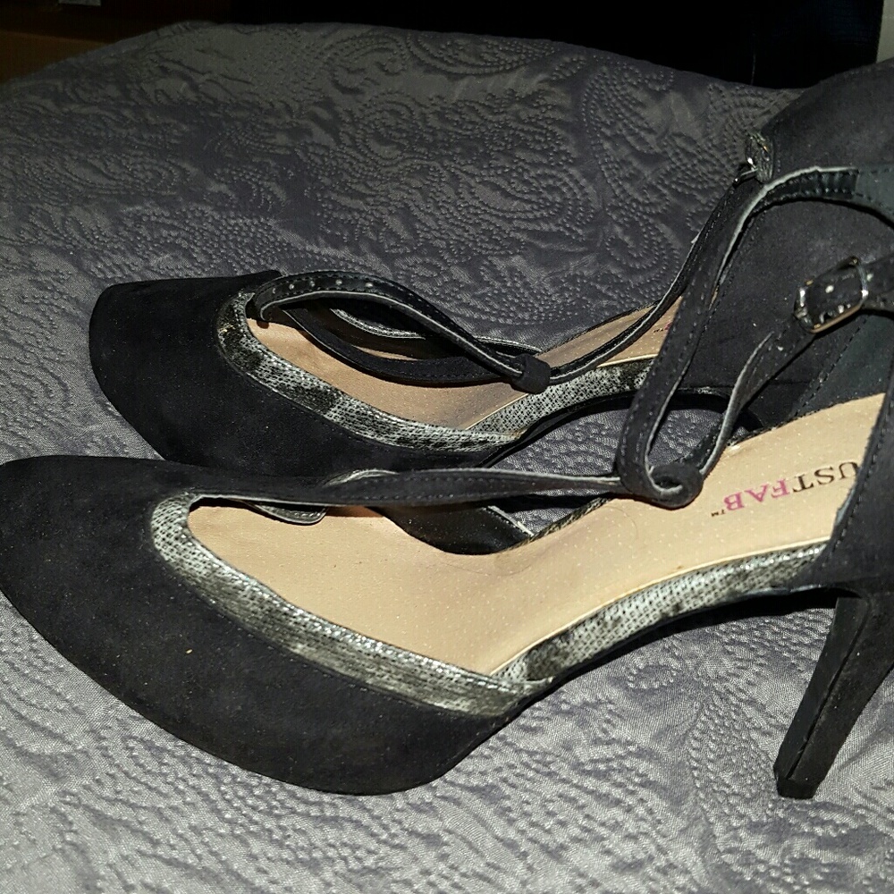 Black t strap with snakeskin details...